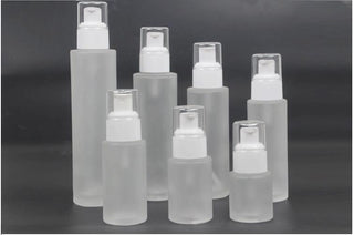 FROSTED GLASS WHITE COSMETIC PUMP BOTTLES (CONTACT US FOR PRICES)