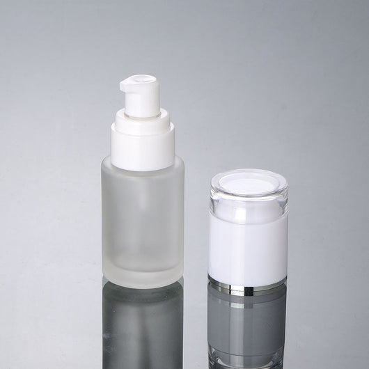 30ml frosted glass bottle with white press pump and white lid with silver band