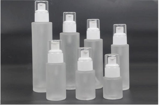 FROSTED GLASS WHITE COSMETIC PUMP BOTTLES (CONTACT US FOR PRICES)